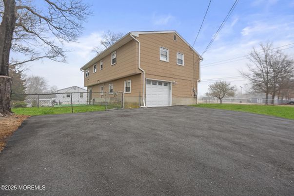 Attached, Backyard, Exterior, Facade, Raised Ranch