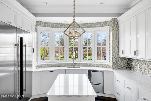 Chandelier, Interior, Kitchen, Pendant Lights, Recessed Lighting, Stainless Steel Appliances, Wood Texture Flooring