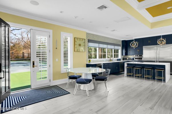 Dining room, Interior, Kitchen, Pendant Lights, Recessed Lighting, Stainless Steel Appliances, Wood Texture Flooring