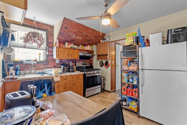 Interior, Kitchen, Stainless Steel Appliances, Stone Walls, Wood Texture Flooring