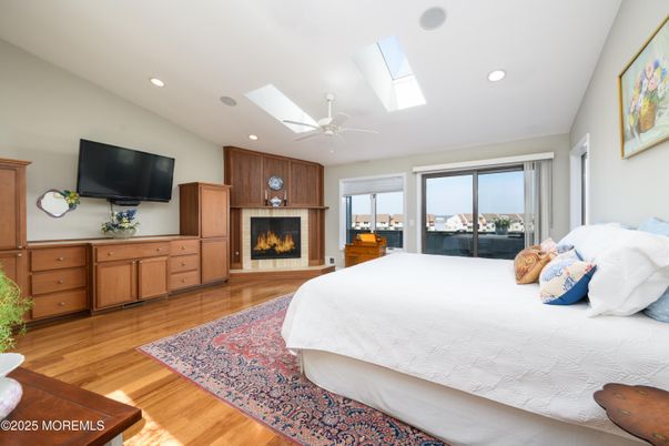 Bedroom, Fireplace, Interior, Recessed Lighting, Wood Texture Flooring
