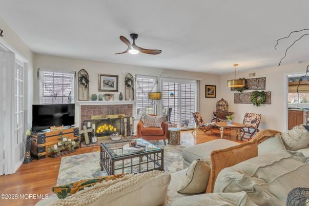 Dining room, Fireplace, Interior, Living room, Pendant Lights, Wood Texture Flooring