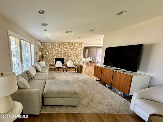 Dining room, Interior, Living room, Recessed Lighting, Stone Walls, Wood Texture Flooring
