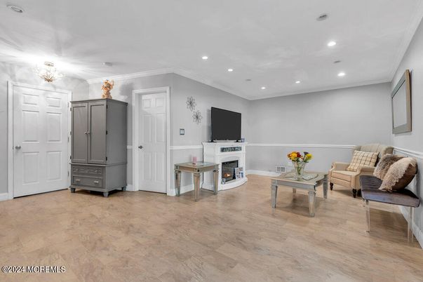 Fireplace, Interior, Living room, Recessed Lighting, Wood Texture Flooring
