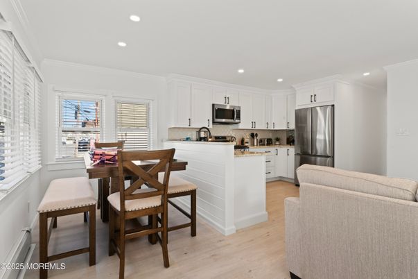 Dining room, Interior, Kitchen, Recessed Lighting, Stainless Steel Appliances, Wood Texture Flooring