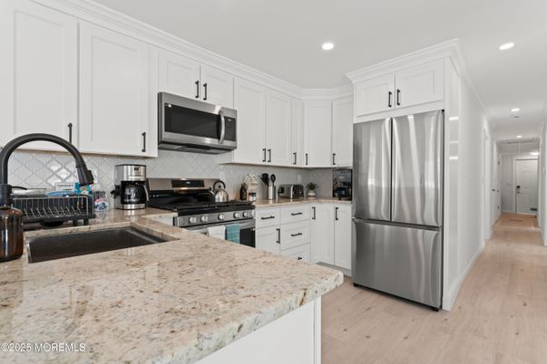 Interior, Kitchen, Recessed Lighting, Stainless Steel Appliances, Wood Texture Flooring