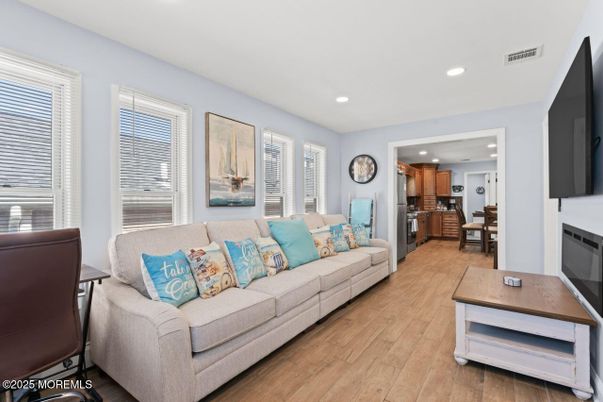 Dining room, Interior, Kitchen, Living room, Recessed Lighting, Stainless Steel Appliances, Wood Texture Flooring
