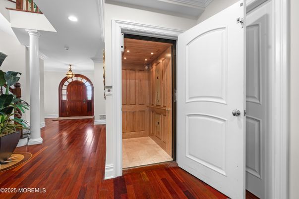 Elevator, Interior, Recessed Lighting, Wooden Ceilings, Wood Texture Flooring, Wooden Walls