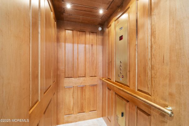 Elevator, Interior, Recessed Lighting, Wooden Ceilings, Wooden Walls
