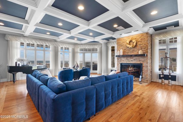 Fireplace, Interior, Living room, Piano, Recessed Lighting, Stone Walls, Wood Texture Flooring