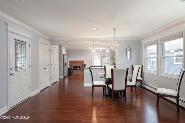 Chandelier, Dining room, Fireplace, Interior, Wood Texture Flooring