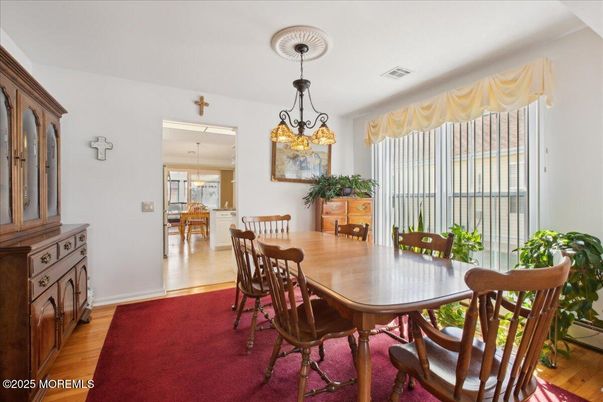 Chandelier, Dining room, Interior, Wood Texture Flooring
