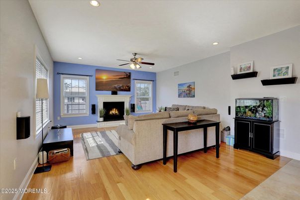 Fireplace, Interior, Living room, Recessed Lighting, Wood Texture Flooring