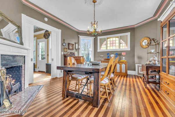 Chandelier, Dining room, Fireplace, Interior, Wood Texture Flooring