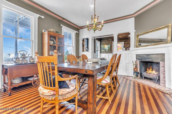 Chandelier, Dining room, Fireplace, Interior, Wood Texture Flooring
