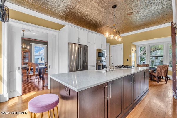 Dining room, Interior, Kitchen, Pendant Lights, Stainless Steel Appliances, Wood Texture Flooring