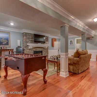Fireplace, Interior, Kitchen, Living room, Recessed Lighting, Stone Walls, Wood Texture Flooring