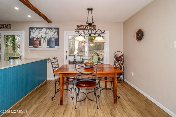 Chandelier, Dining room, Interior, Recessed Lighting, Wooden Beams, Wood Texture Flooring