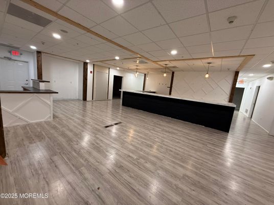 Interior, Marble Walls, Pendant Lights, Recessed Lighting, Wood Texture Flooring