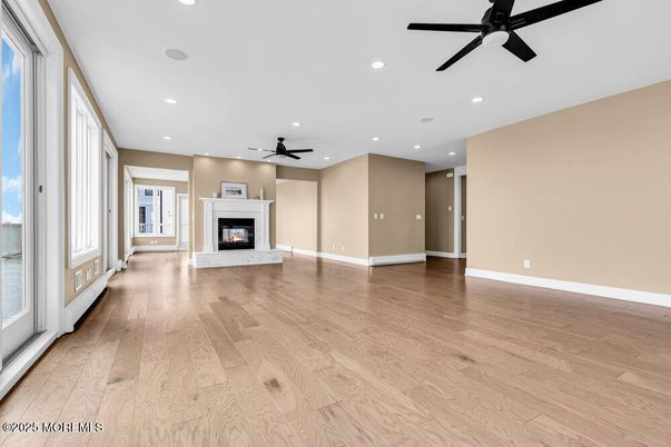 Empty room, Fireplace, Interior, Recessed Lighting, Wood Texture Flooring