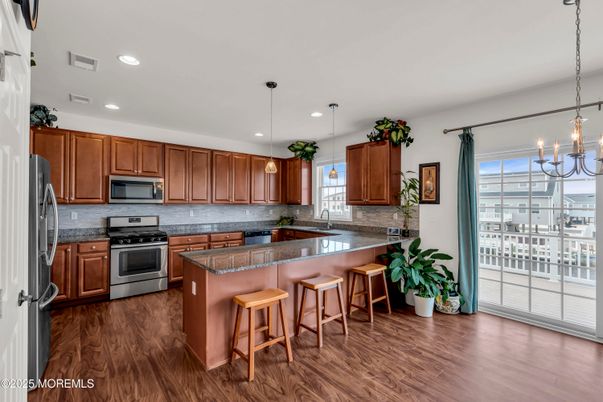 Chandelier, Interior, Kitchen, Pendant Lights, Recessed Lighting, Stainless Steel Appliances, Wood Texture Flooring