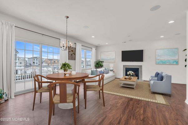 Chandelier, Dining room, Fireplace, Interior, Living room, Pendant Lights, Recessed Lighting, Wood Texture Flooring