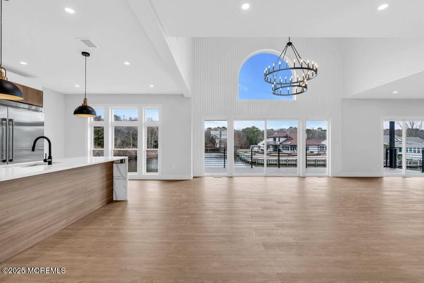 Chandelier, Interior, Kitchen, Pendant Lights, Recessed Lighting, Stainless Steel Appliances, Wood Texture Flooring