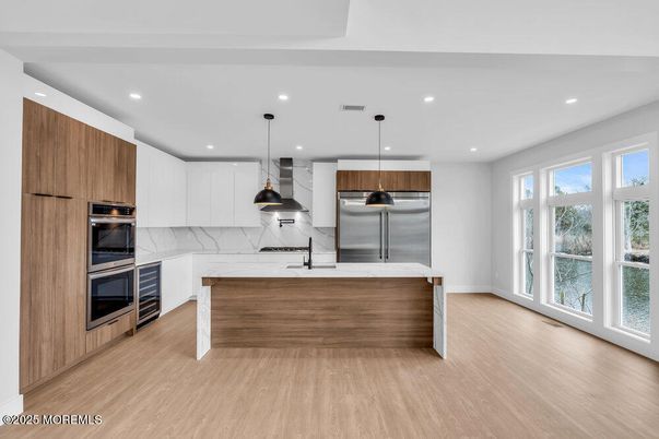 Interior, Kitchen, Pendant Lights, Recessed Lighting, Stainless Steel Appliances, Wood Texture Flooring