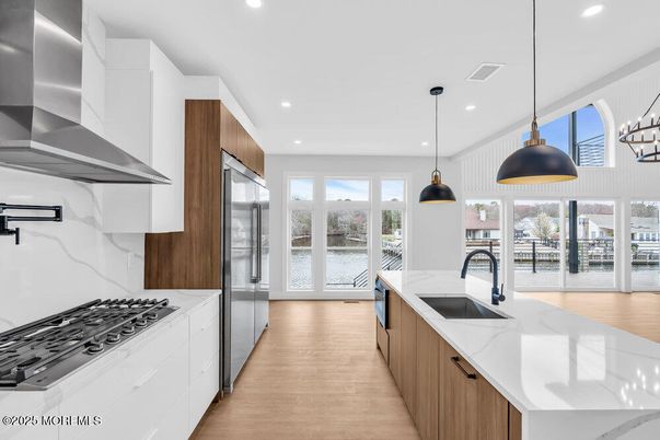 Interior, Kitchen, Pendant Lights, Recessed Lighting, Stainless Steel Appliances, Water, Wood Texture Flooring