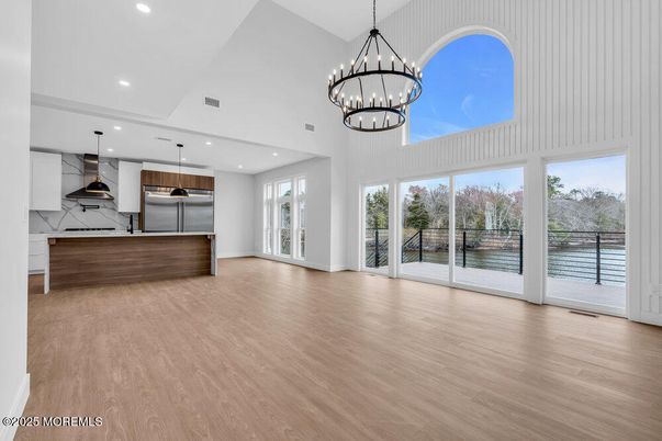 Chandelier, Interior, Kitchen, Pendant Lights, Recessed Lighting, Stainless Steel Appliances, Wood Texture Flooring
