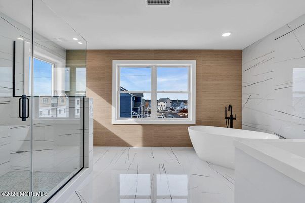 Bathroom, Free Standing Baths, Glass Shower, Interior, Marble, Marble Walls, Recessed Lighting, Water