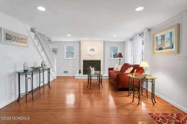Fireplace, Interior, Living room, Recessed Lighting, Wood Texture Flooring