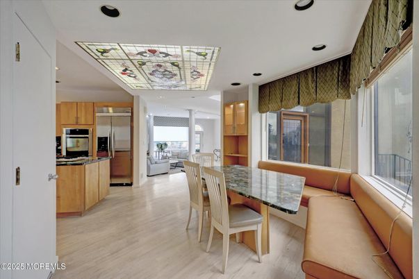 Dining room, Interior, Kitchen, Recessed Lighting, Stainless Steel Appliances, Wood Texture Flooring