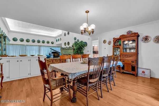 Chandelier, Dining room, Interior, Piano, Wood Texture Flooring