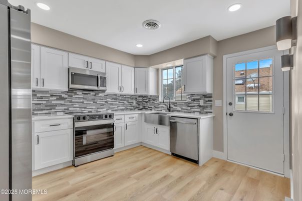 Interior, Kitchen, Recessed Lighting, Stainless Steel Appliances, Wood Texture Flooring