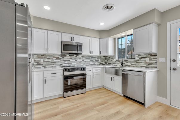 Interior, Kitchen, Recessed Lighting, Stainless Steel Appliances, Wood Texture Flooring