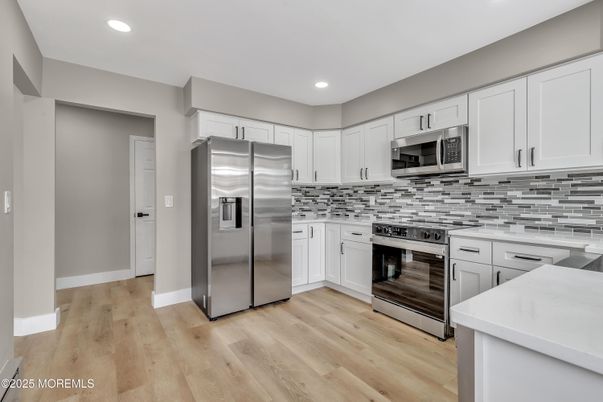 Interior, Kitchen, Recessed Lighting, Stainless Steel Appliances, Wood Texture Flooring