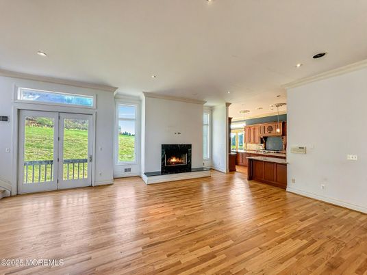 Empty room, Fireplace, Interior, Kitchen, Pendant Lights, Recessed Lighting, Wood Texture Flooring