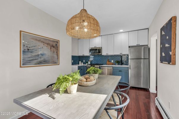 Dining room, Interior, Kitchen, Pendant Lights, Recessed Lighting, Stainless Steel Appliances, Wood Texture Flooring