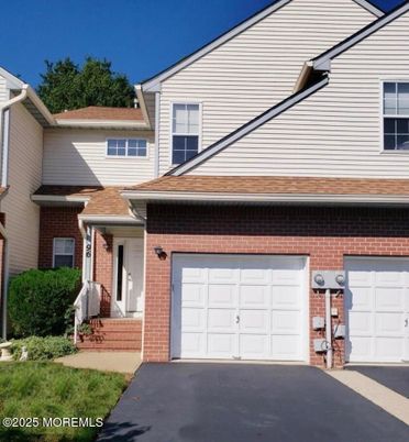 Attached, Exterior, Facade, Brick Facade, Rowhouse