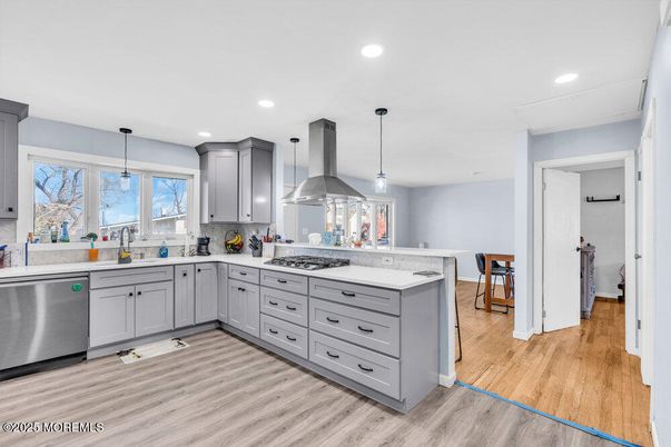 Interior, Kitchen, Pendant Lights, Recessed Lighting, Stainless Steel Appliances, Wood Texture Flooring