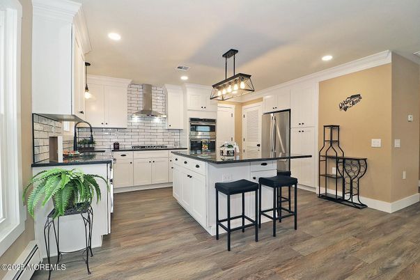 Interior, Kitchen, Pendant Lights, Recessed Lighting, Stainless Steel Appliances, Wood Texture Flooring