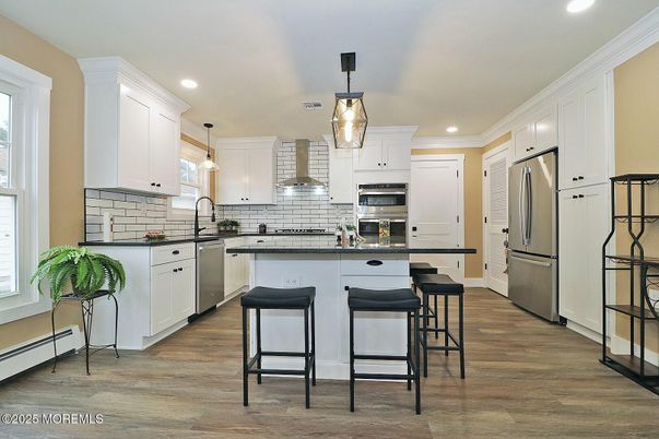 Interior, Kitchen, Pendant Lights, Recessed Lighting, Stainless Steel Appliances, Wood Texture Flooring