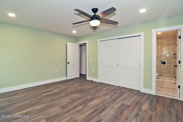 Bathroom, Empty room, Glass Shower, Interior, Recessed Lighting, Wood Texture Flooring