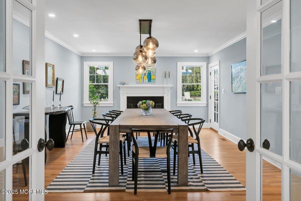 Dining room, Fireplace, Interior, Pendant Lights, Recessed Lighting, Wood Texture Flooring