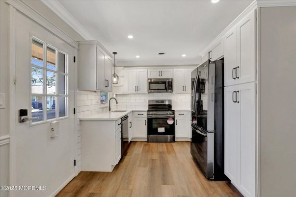 Interior, Kitchen, Pendant Lights, Recessed Lighting, Stainless Steel Appliances, Wood Texture Flooring