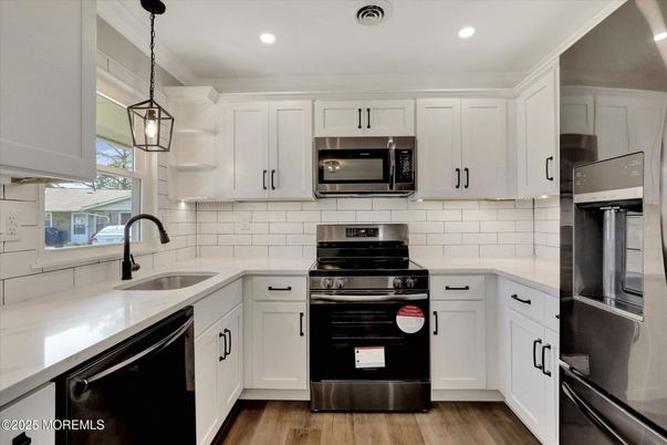 Interior, Kitchen, Pendant Lights, Recessed Lighting, Stainless Steel Appliances, Wood Texture Flooring