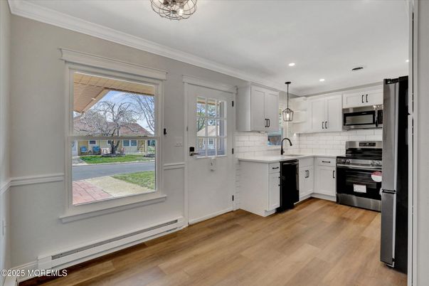 Interior, Kitchen, Pendant Lights, Recessed Lighting, Stainless Steel Appliances, Wood Texture Flooring