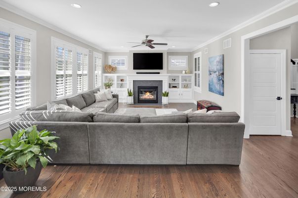 Fireplace, Interior, Living room, Recessed Lighting, Wood Texture Flooring
