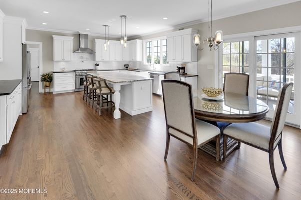 Dining room, Interior, Kitchen, Pendant Lights, Recessed Lighting, Stainless Steel Appliances, Wood Texture Flooring